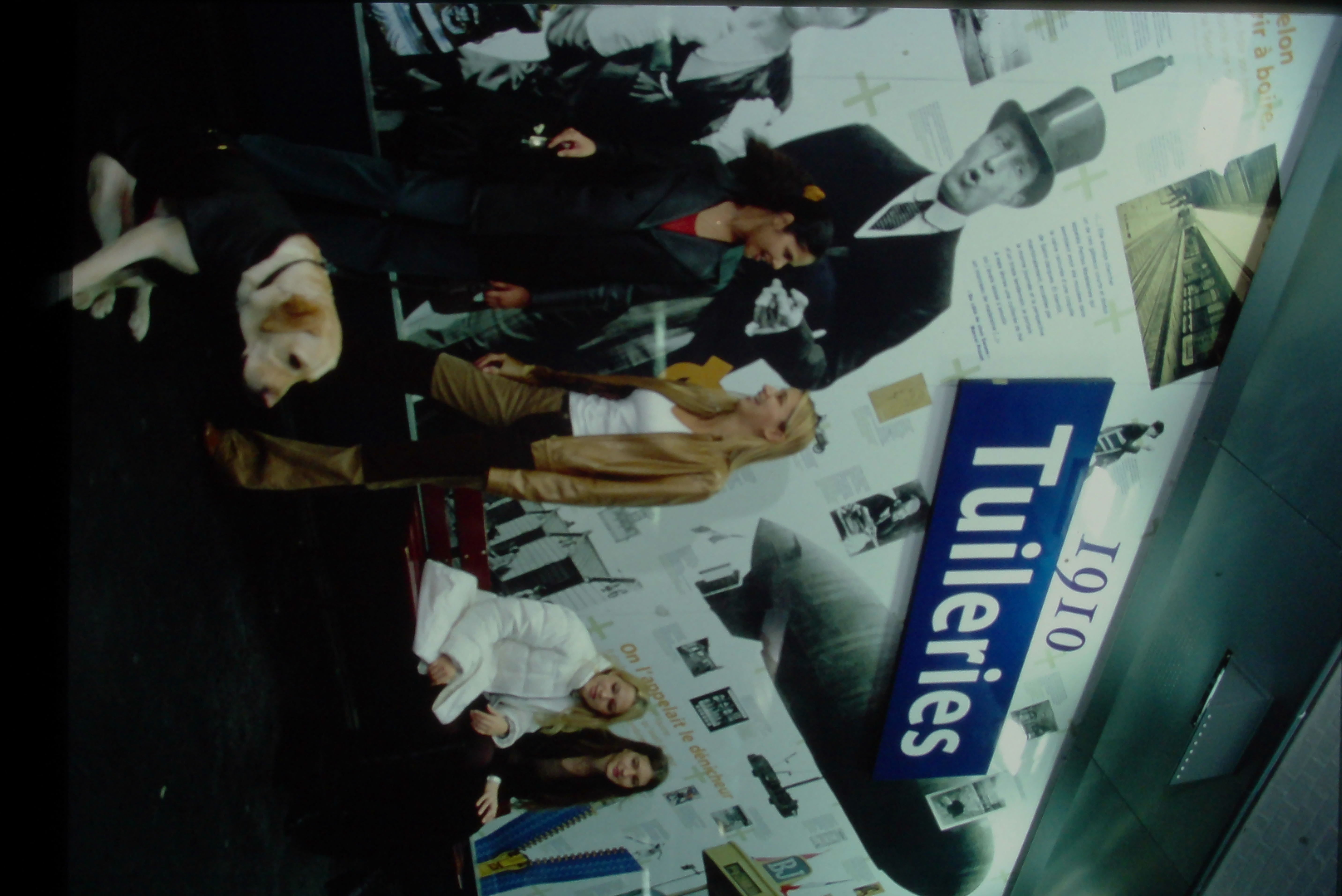 Students at Tuileries metro station