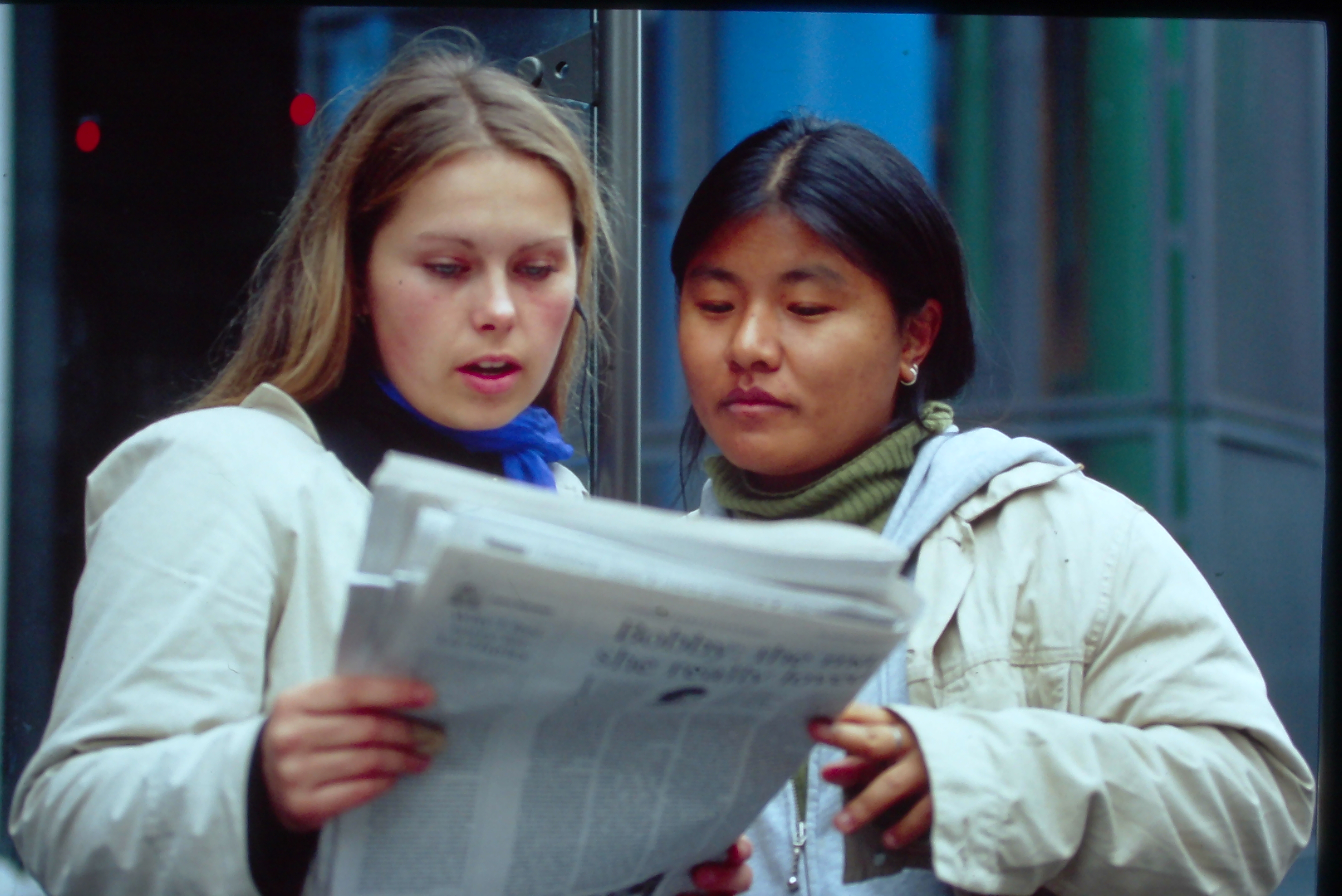 Students reading a newspaper