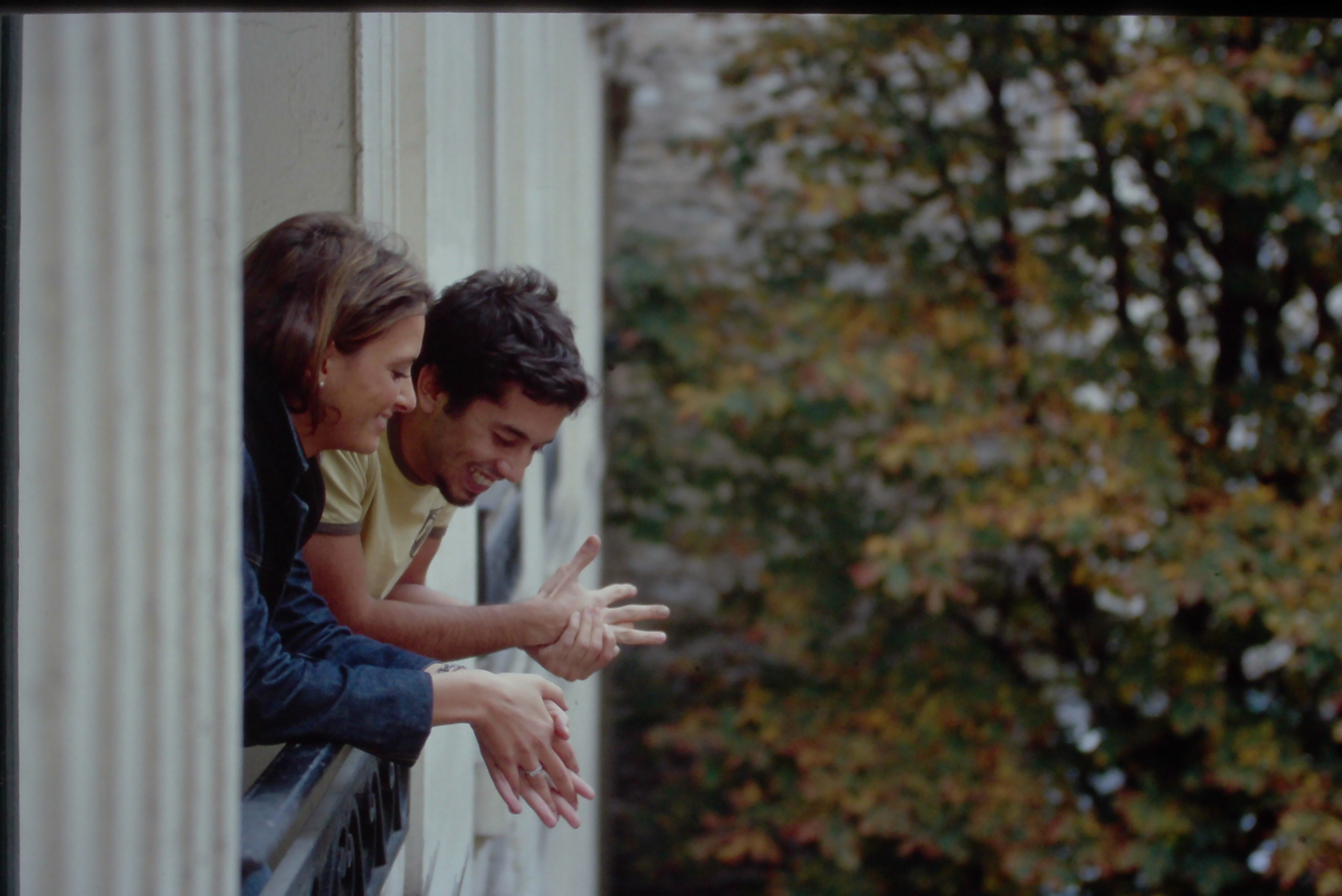 Two students in discussion in a Parisian window